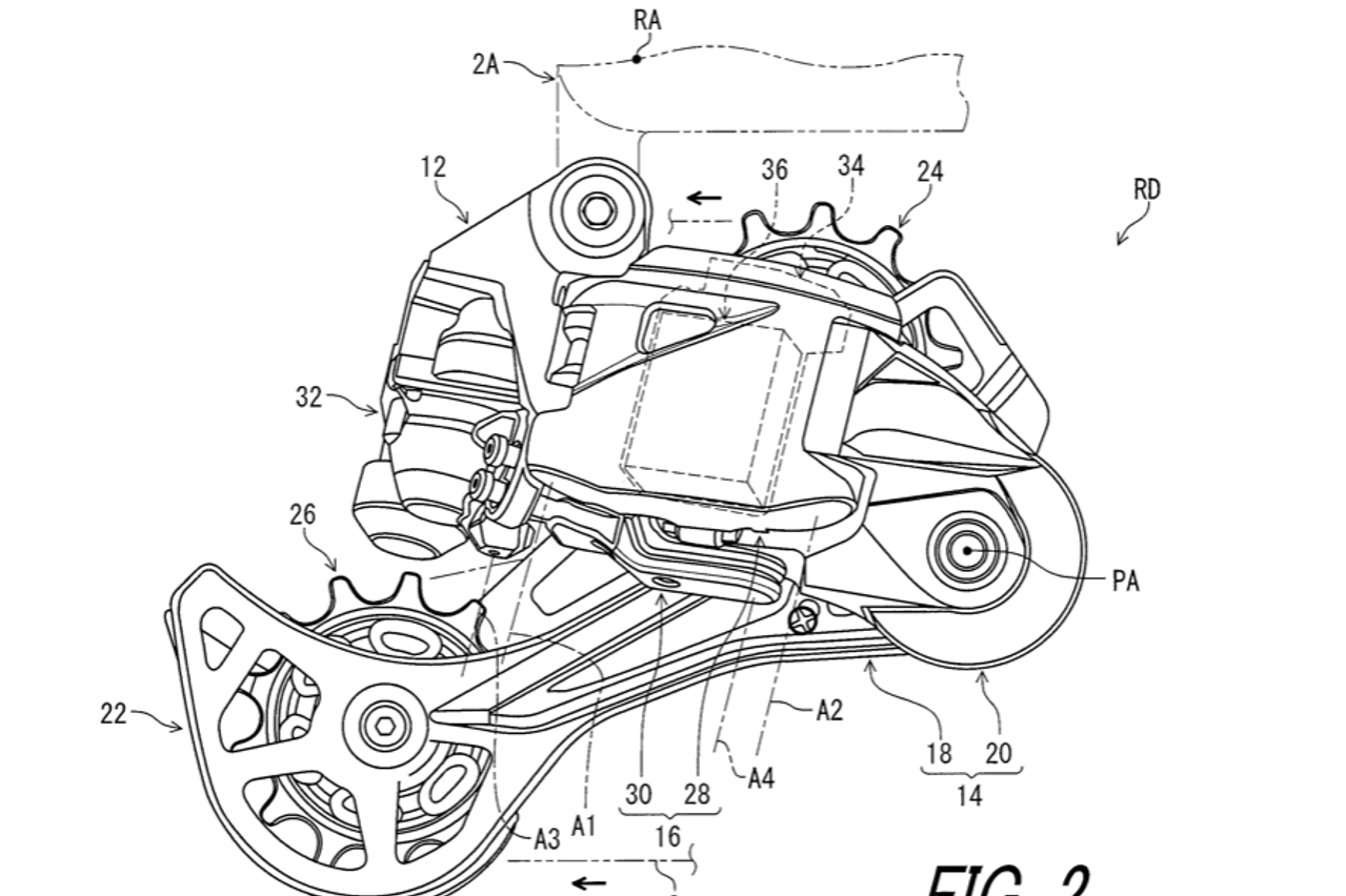 Annotation 34 shows an “electric power source” housed in a rear derailleur